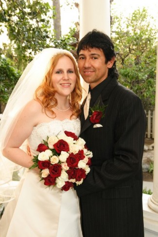 Bride Groom with redwood and ivory rose wedding bouquet