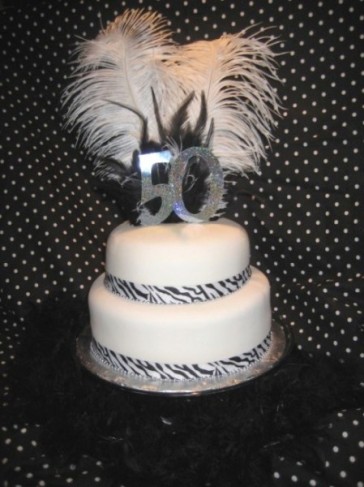  of the party which was black and white. What a cool 50th birthday cake!