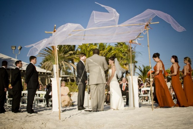 Beach weddings are very popular Light wedding canopies like this fit the 