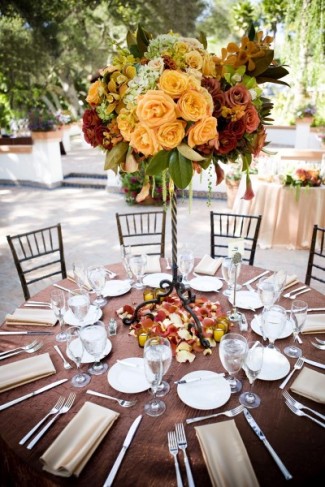 This is a very elaborate outdoor wedding reception with beautiful chocolate