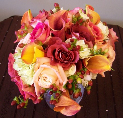  displayed like shown here in a colorful vase as a wedding centerpiece