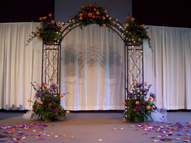 The colors of the wedding flowers purple orange burgundy also appeal to