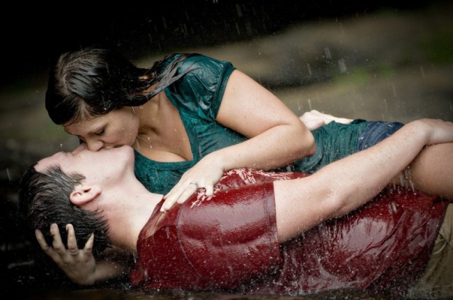 romantic couple kissing in the rain. Kissing In The Rain Share