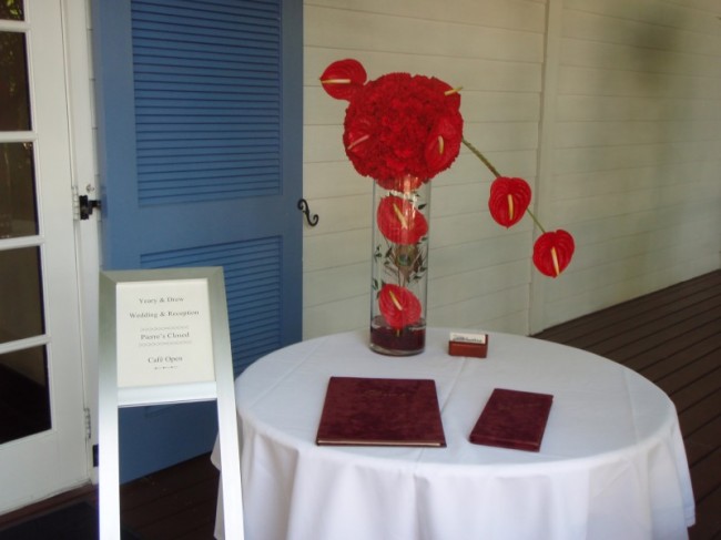 Red Romance unique sign in table centerpiece made with red dianthus and red