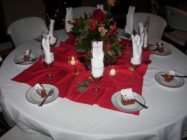 This beautiful red and white tablescape is part of a beautiful wedding 
