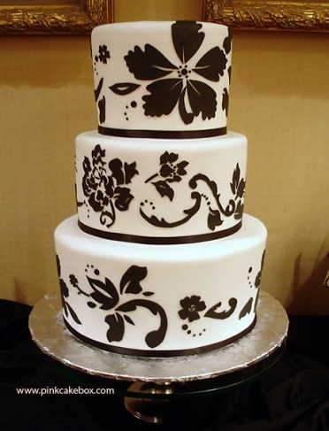 Though it may be decorated in white and brown colors this wedding cake was