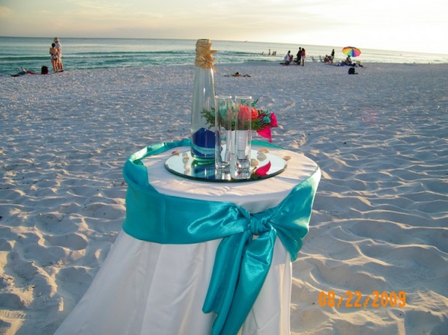 This wedding photo shows the table where the sand ceremony would be