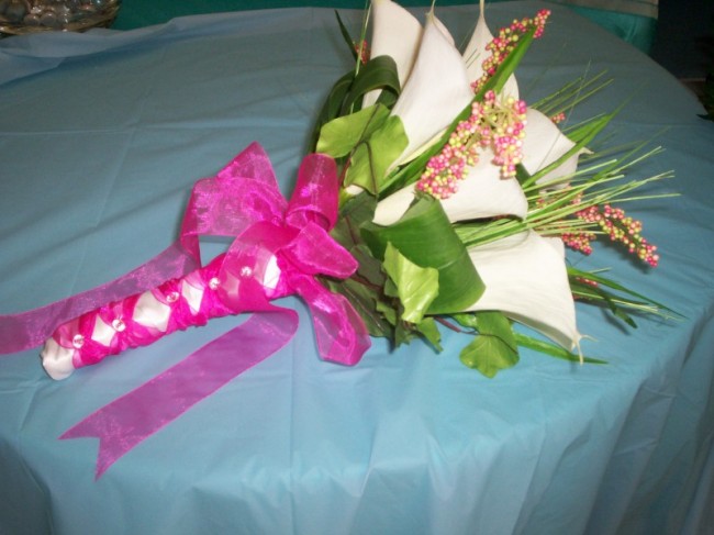 This unique silk wedding bouquet is created using white silk calla lilies 