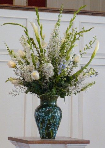 Wedding Party Photo Gallery Floral Centerpiece in Unique Blue Vase 