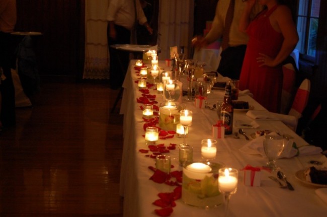  floating candle orchid centerpieces and votive candles in various sizes 