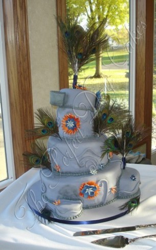 Naomi chose a slate gray blue wedding cake for her wedding reception