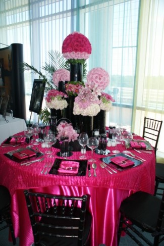 The color theme of this wedding reception was hot pink and black