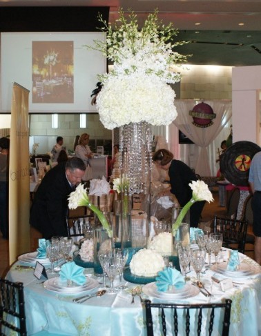 Creative is the way to go for wedding reception centerpieces like this one