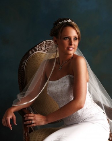 The pose for this elegant bridal portrait was chosen for its unique ability