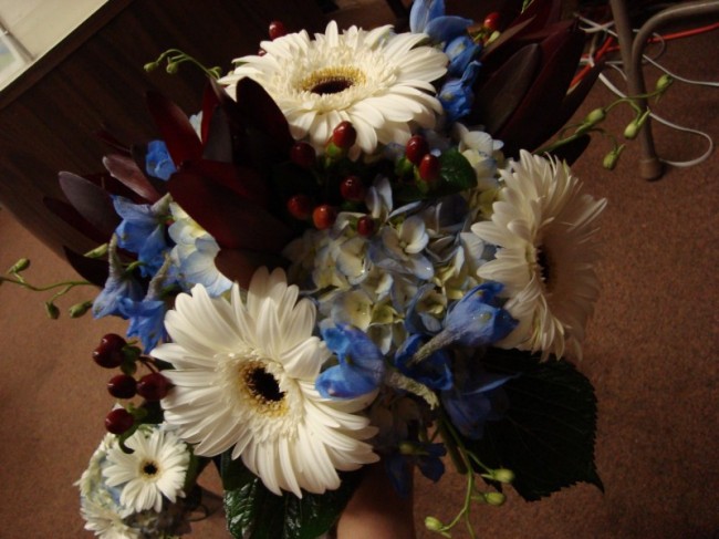 This bridal bouquet photo from Flowers Etc by York shows a blue and white 