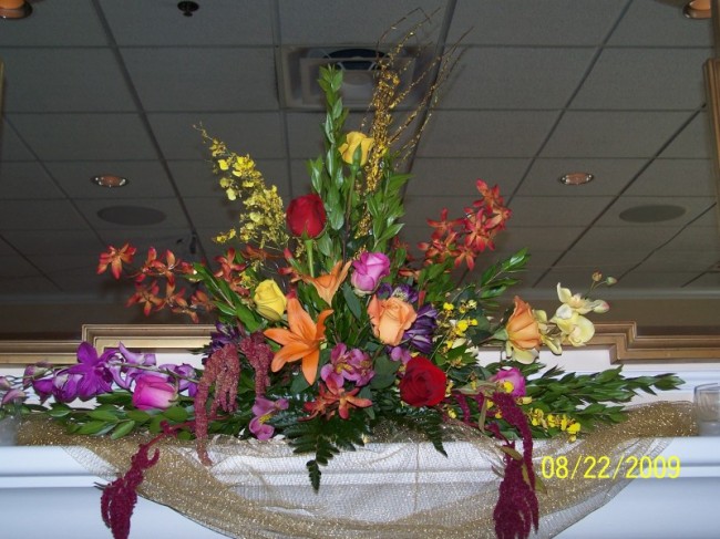 This colorful flower arrangement was the perfect decoration at this wedding