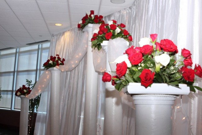 Wedding Columns With Christmas Flowers Share