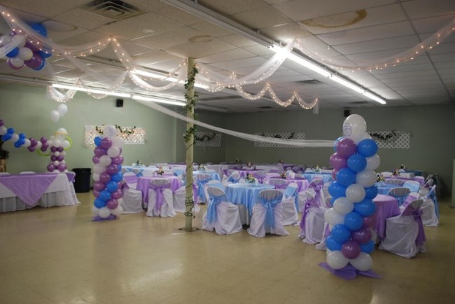 Beautiful purple blue and white themed wedding reception hall with balloon