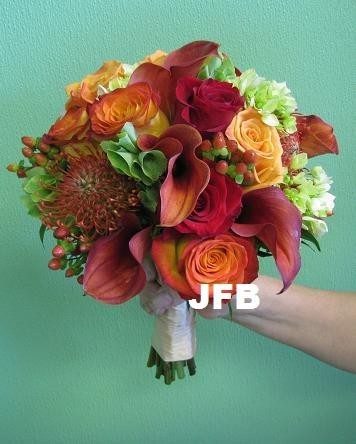 This gorgeous Fall wedding bouquet is designed with a variety of different
