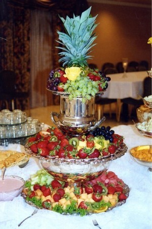 This fruity wedding reception food table is filled to the brim with berries 