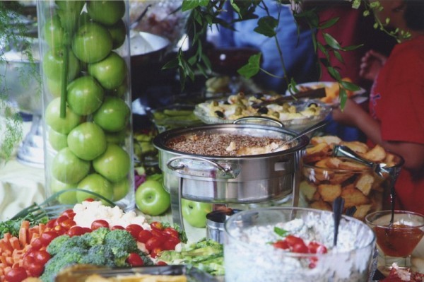  wedding reception food table really stands out A tall fruit centerpiece 