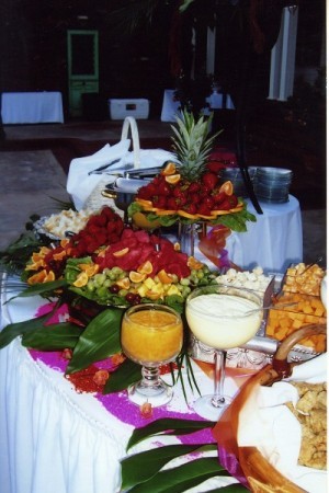Fruits galore decorate this wedding reception food table