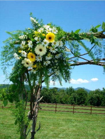White Wedding Arbor. Wedding Flowers For Arbor