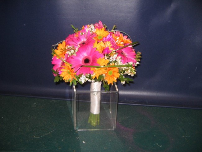 This bright daisy wedding bouquet is very colorful and will brighten up your