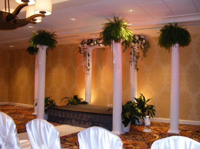 Ceremony Decor Share Rental columns plants lighting and flowers convert 