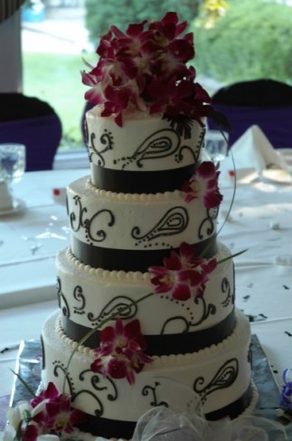 Elegant wedding cake with cascading orchids makes for a wonderful cake 