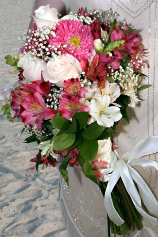 Gourgeous Summery wedding bouquet featured in pretty pink and ivory flowers