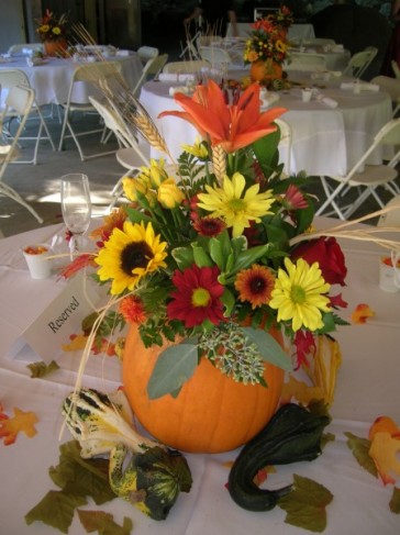 This floral centerpiece is perfect for a fall themed wedding