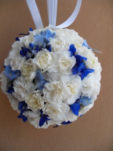 This flower ball bouquet has been made from white and royal blue flowers and