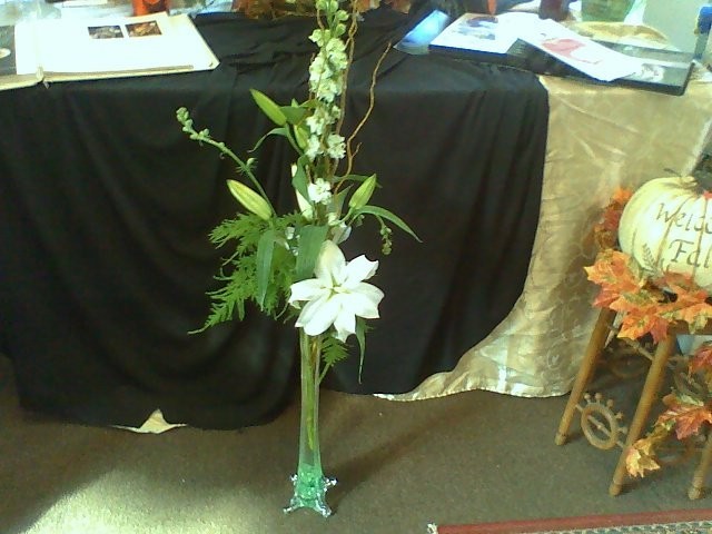 This floral centerpiece has been made from beautiful white lilies