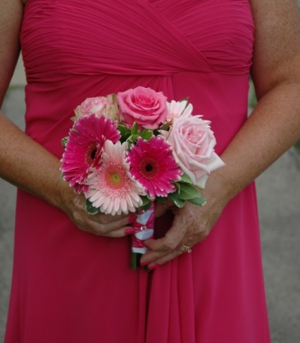 This hot pink bridesmaids dress has been complemented perfectly with these