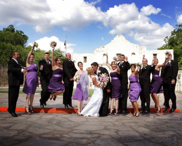 This fun wedding portrait truly captures how much fun everyone is having 