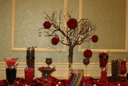 this fun candy buffet table is a fun accent to any wedding or event
