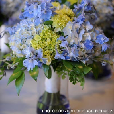 This wedding bouquet is so elegant With it's blue and green flowers 