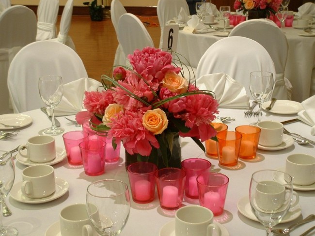 This colorful peony table arrangement makes a great wedding reception