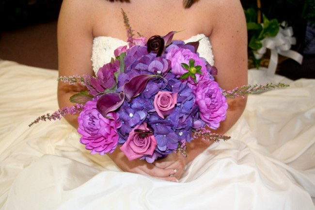 This gorgeous purple wedding bouquet features different hues of purple