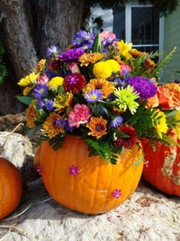 We used a real pumpkin for this wedding centerpiece