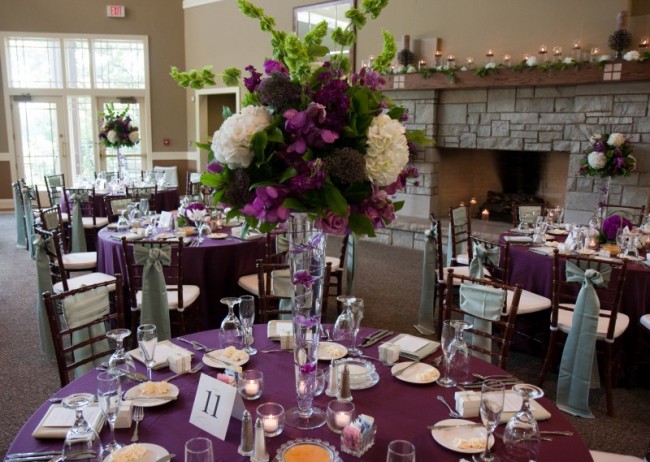 This beautiful purple and cream wedding centerpiece is made up of hydrangeas