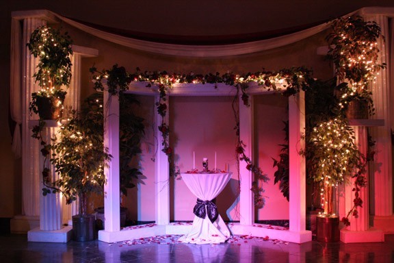 This beautiful wedding ceremony location features beautiful plants and 