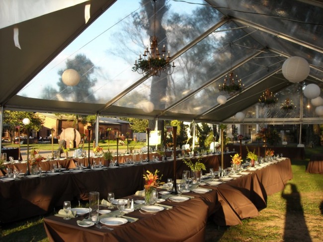 This beautiful wedding reception is featured underneath the tent and the 