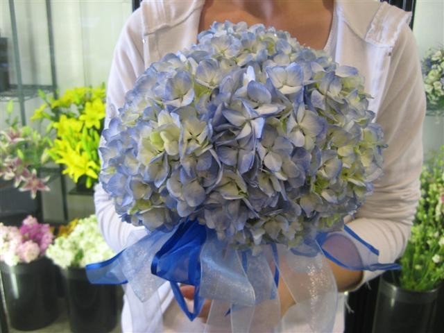 This gorgeous blue hydrangea wedding bouquet is simply beautiful