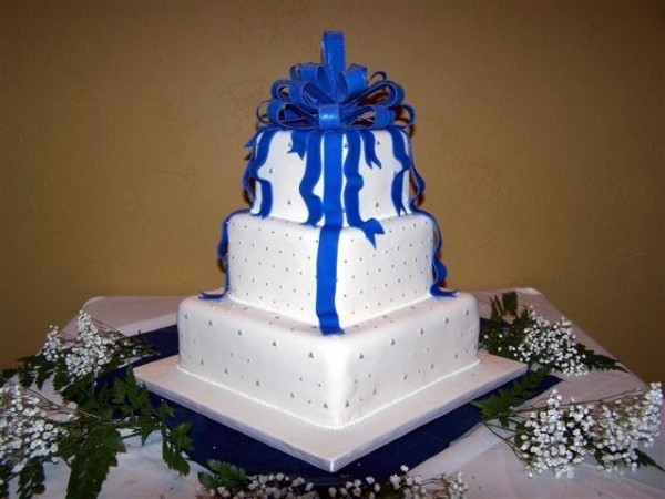 Adrianne's Wedding Cake Share Cascading royal blue ribbons and a matching