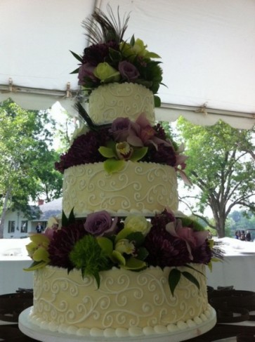 A square three tier wedding cake for a reception at the Orange Lawn Tennis