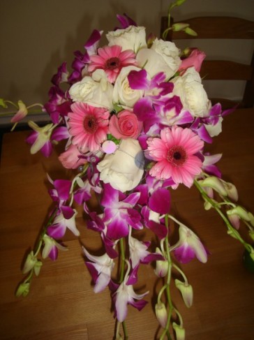 This gorgeous wedding bouquet features white pink and fuschia flowers