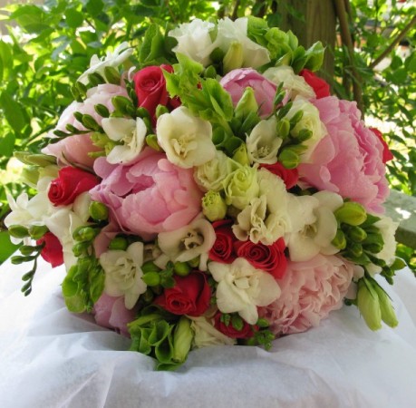 This gorgeous bridal bouquet is full of Peonies and Roses