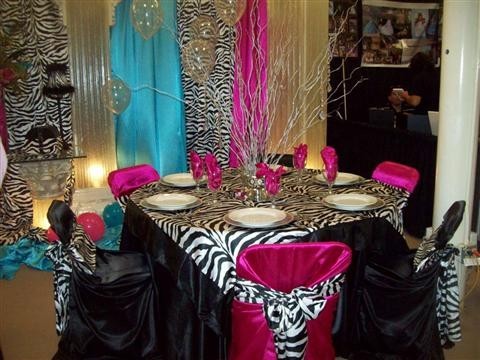  fun birthday party decorations feature pink and blue with a zebra print